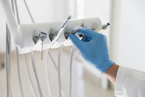Professional Tooth Extraction technician working in Stony Point, MI
